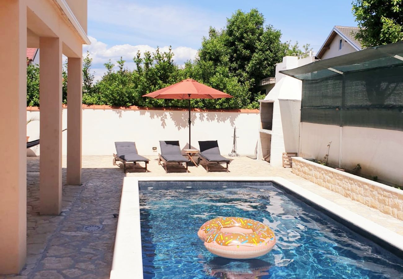 Апартаменты на Privlaka - Apartment 5237-2 for 6+1 Pers. in Privlaka