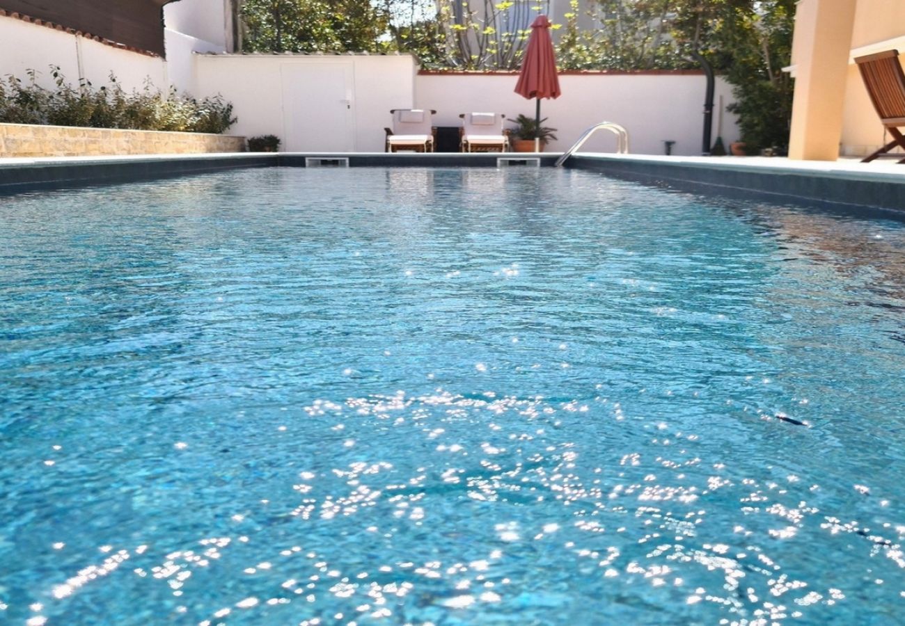 Апартаменты на Privlaka - Apartment 5237-3 for 2+1 Pers. in Privlaka