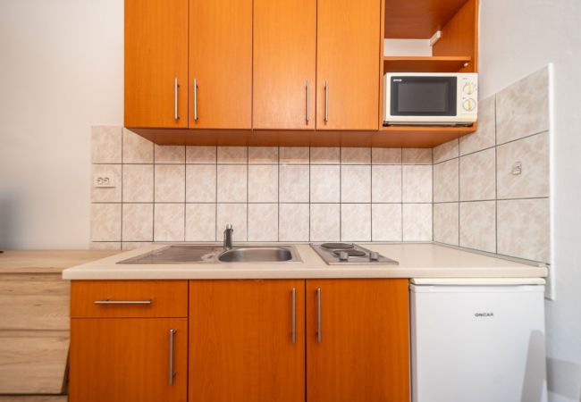 Ferienwohnung in Rab - Ferienwohnung in Barbat mit Meerblick, Balkon, Klimaanlage (660-1) Ferienwohnung in Rab - Ferienwohnung in Barbat mit Meerblick, Balkon, Klimaanlage (660-1)