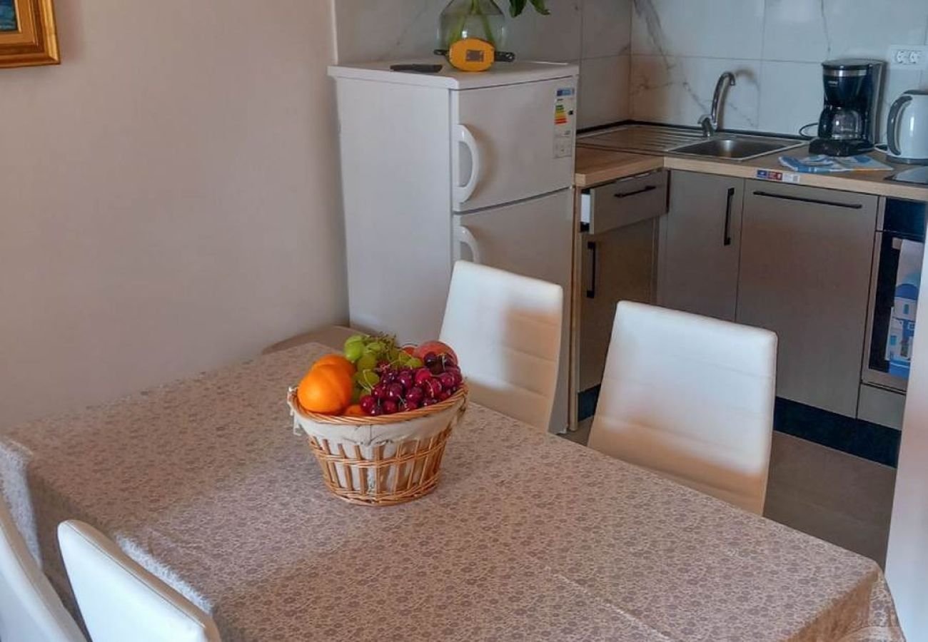 Ferienwohnung in Rab - Ferienwohnung in Barbat mit Meerblick, Balkon, Klimaanlage (660-4)