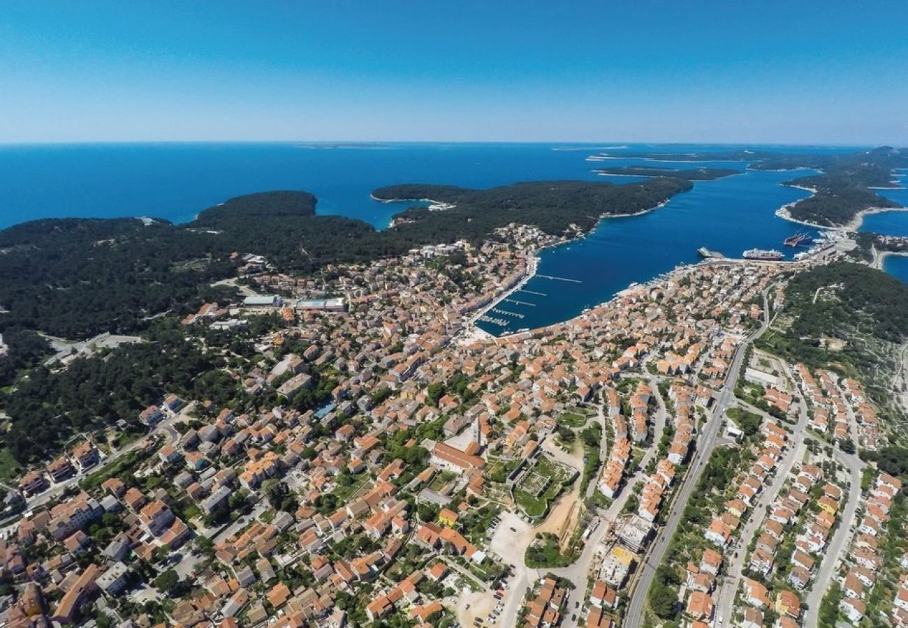 Ferienhaus in Mali Lošinj - Ferienhaus in Mali Lošinj mit Terrasse, Klimaanlage, W-LAN, Waschmaschine (4780-1)