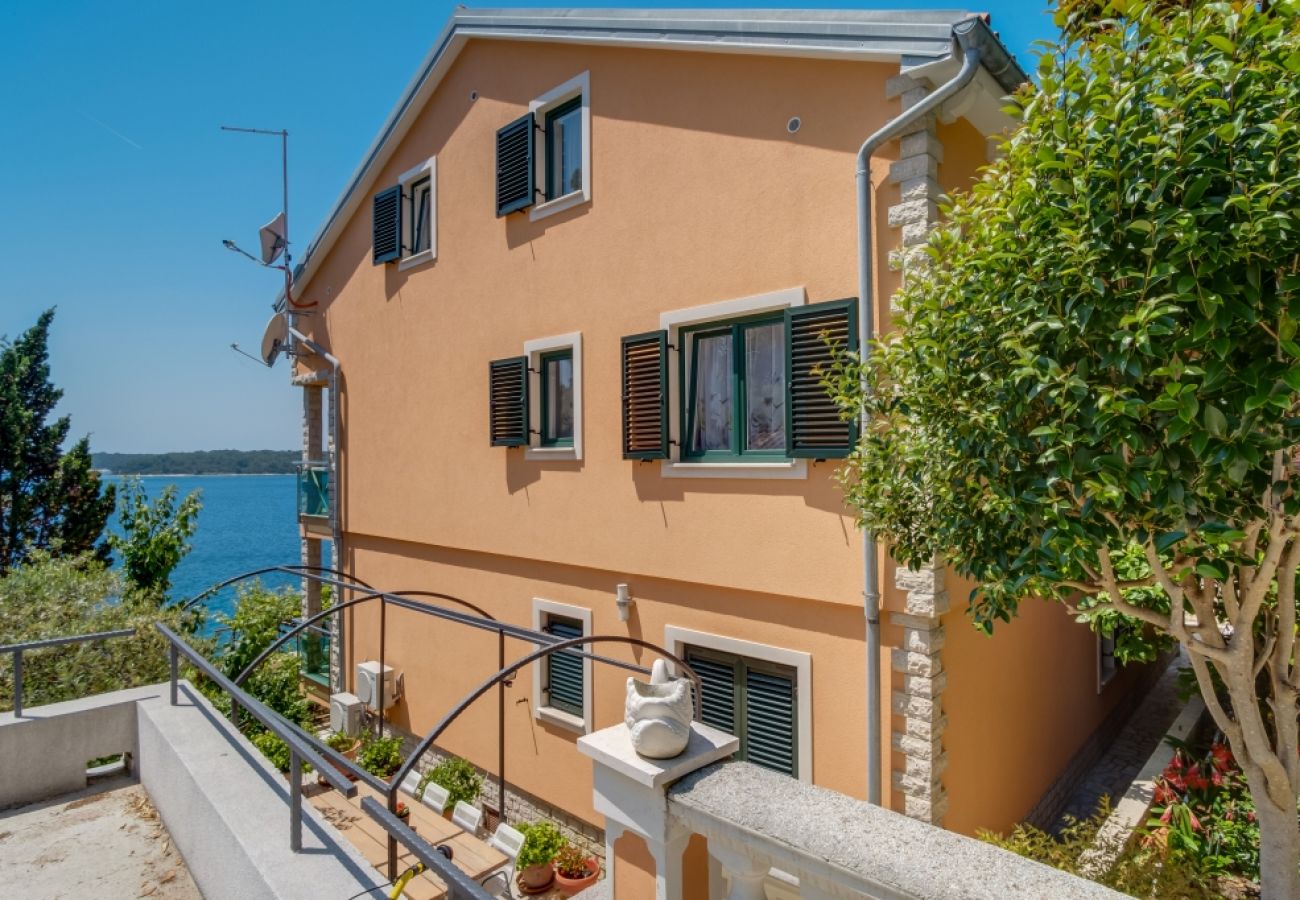 Ferienwohnung in Mali Lošinj - Ferienwohnung in Mali Lošinj mit Meerblick, Balkon, Klimaanlage, W-LAN (4896-4)