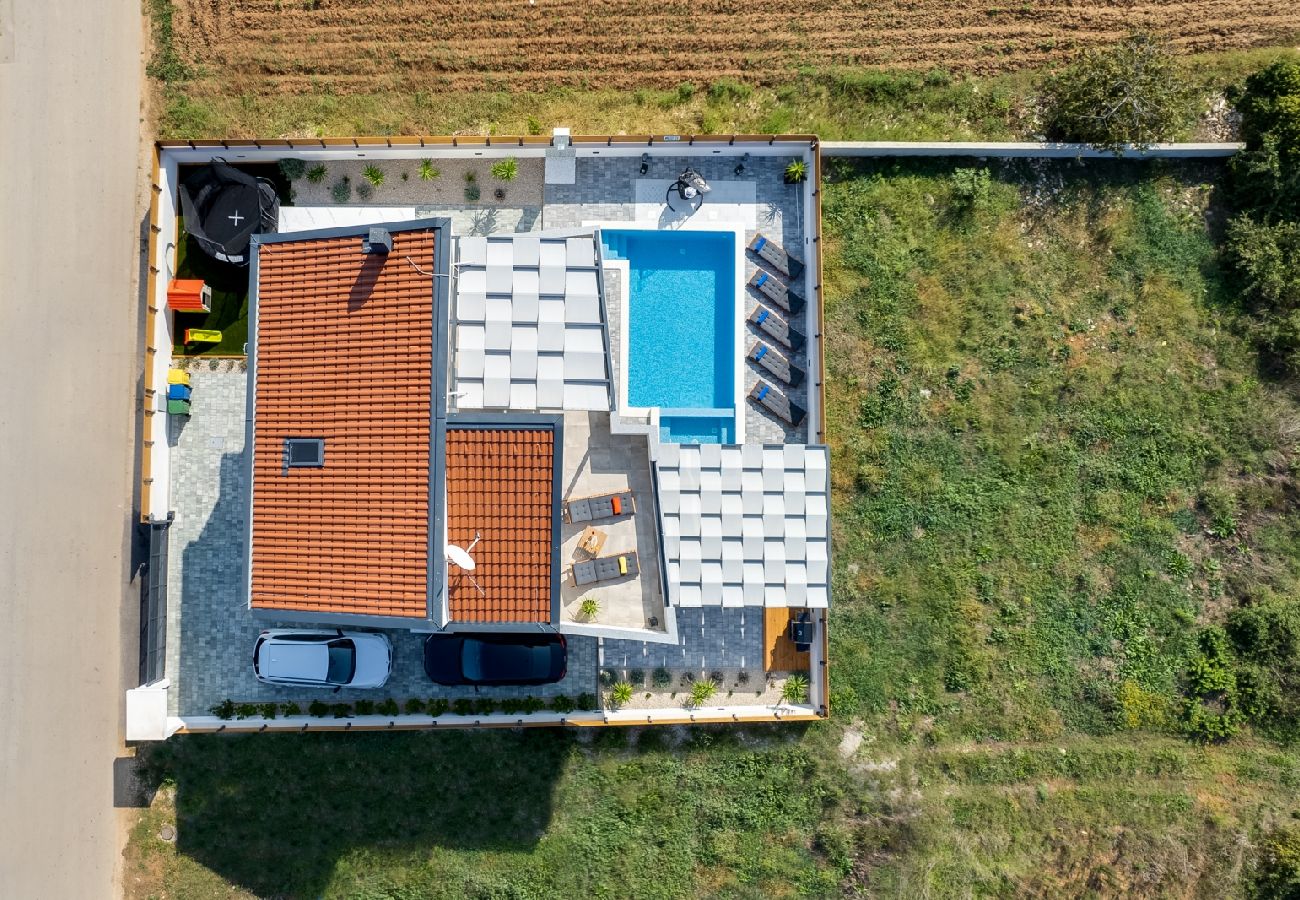 Ferienhaus in Bibinje - Ferienhaus in Bibinje mit Meerblick, Balkon, Klimaanlage, W-LAN (5201-1)